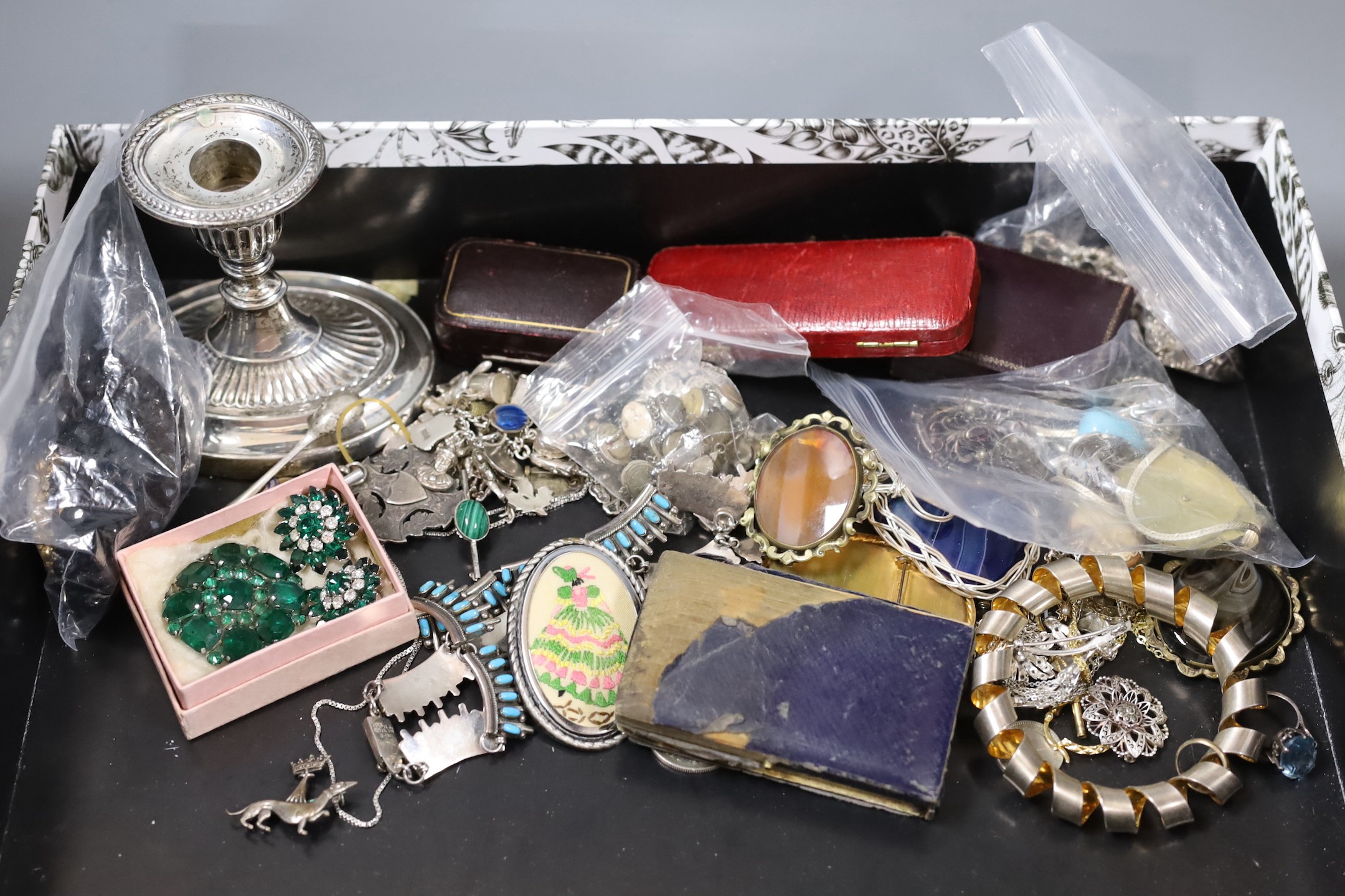 Mixed costume jewellery and other items including silver charm bracelet and silver and enamel baby brooch, Maundy money and a silver mounted dwarf candlestick.